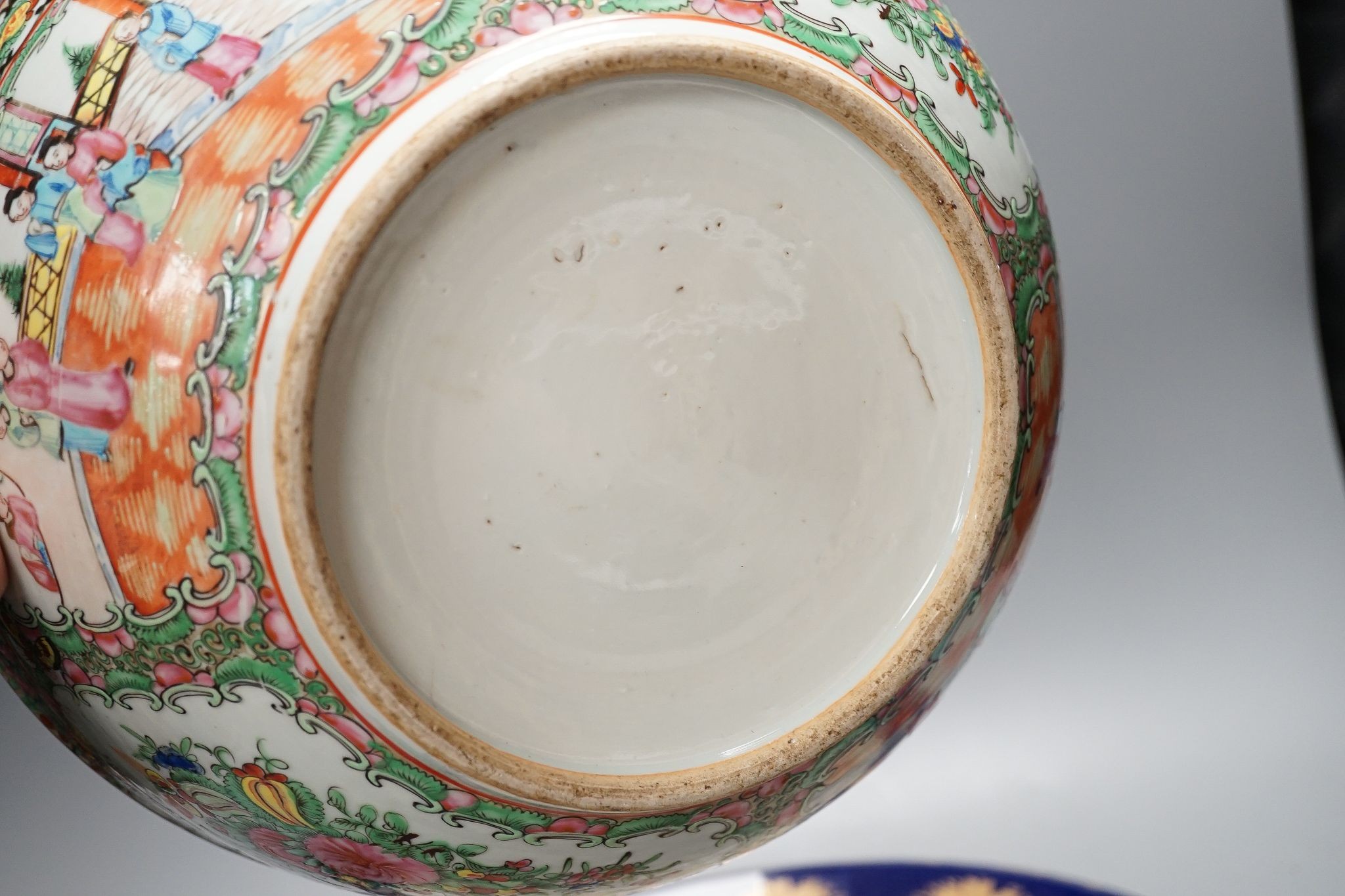A late 19th century famille rose bowl and a Chinese porcelain dish, bowl 30 cms diameter.
